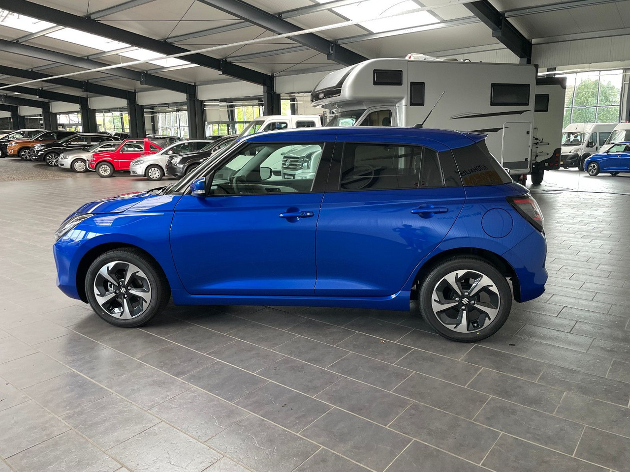 Suzuki Swift 1.2 DUALJET HYBRID Comfort+ - Αυτοκίνητο: φωτογραφία 5 Suzuki Swift 1.2 DUALJET HYBRID Comfort+ - Αυτοκίνητο: φωτογραφία 5