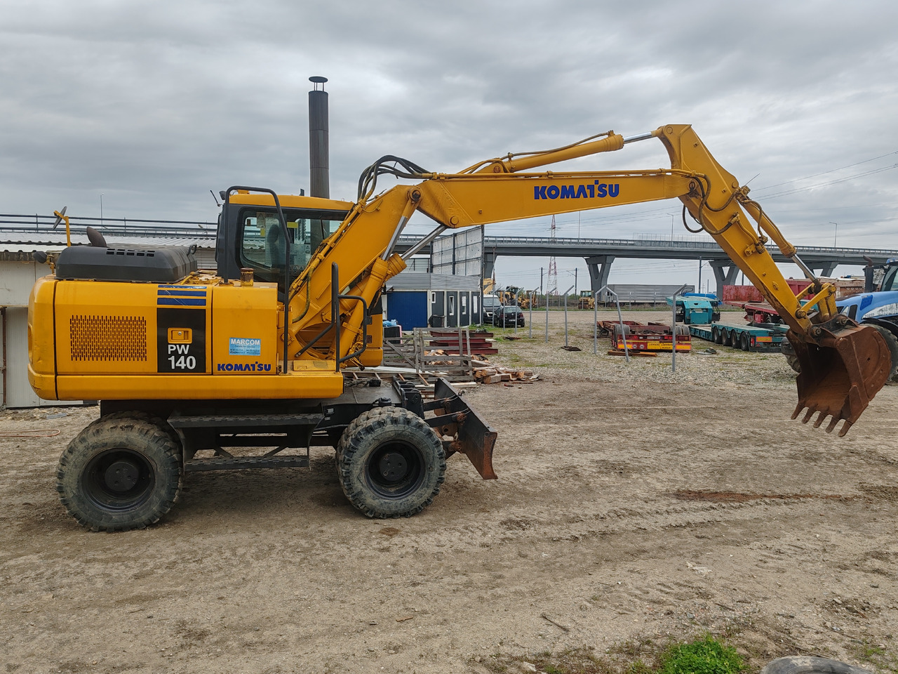 Komatsu PW140-7 - Τροχοφόρος εκσκαφέας: φωτογραφία 4 Komatsu PW140-7 - Τροχοφόρος εκσκαφέας: φωτογραφία 4