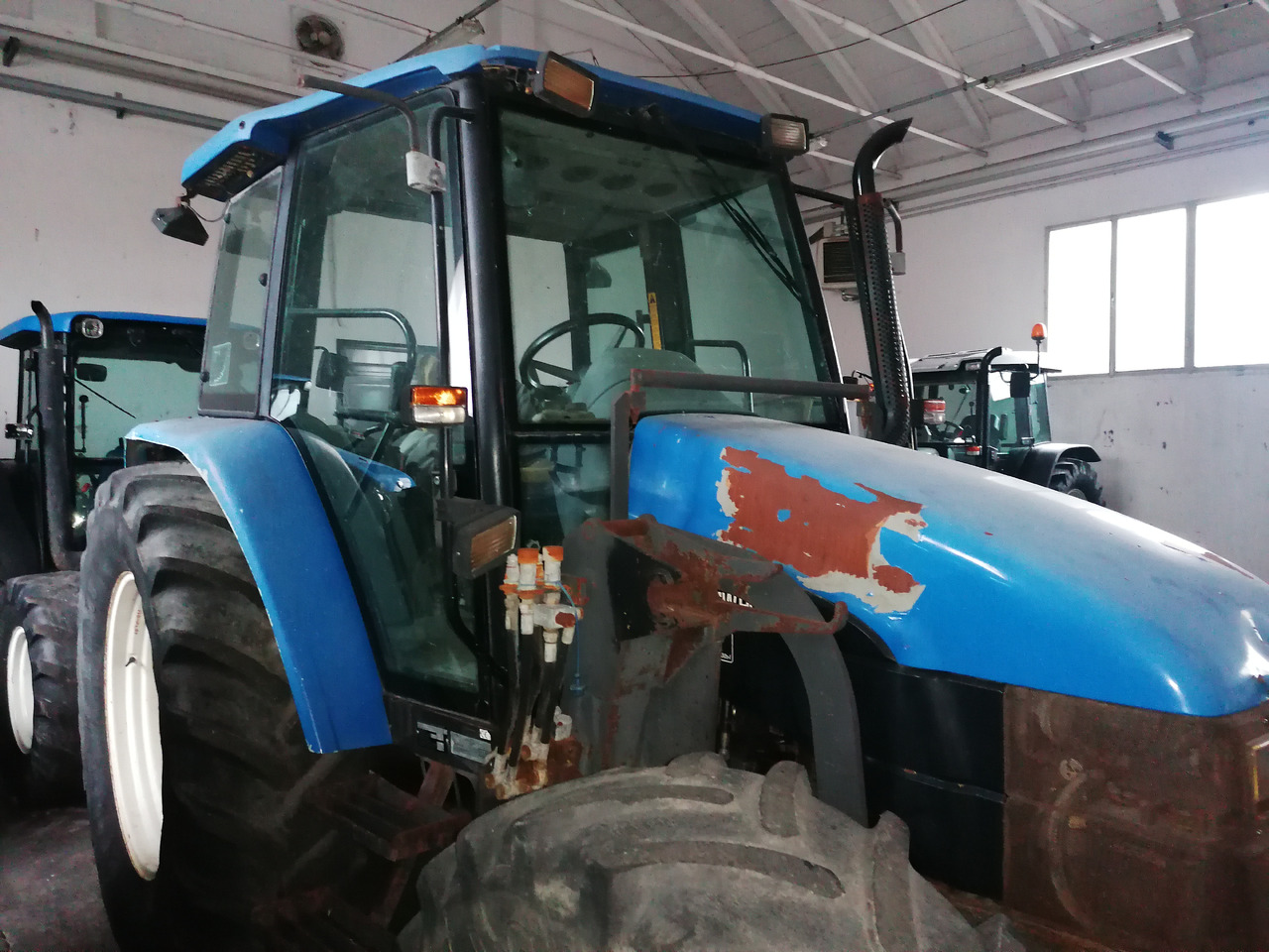 NEW HOLLAND TL 90 - Τρακτέρ: φωτογραφία 1 NEW HOLLAND TL 90 - Τρακτέρ: φωτογραφία 1