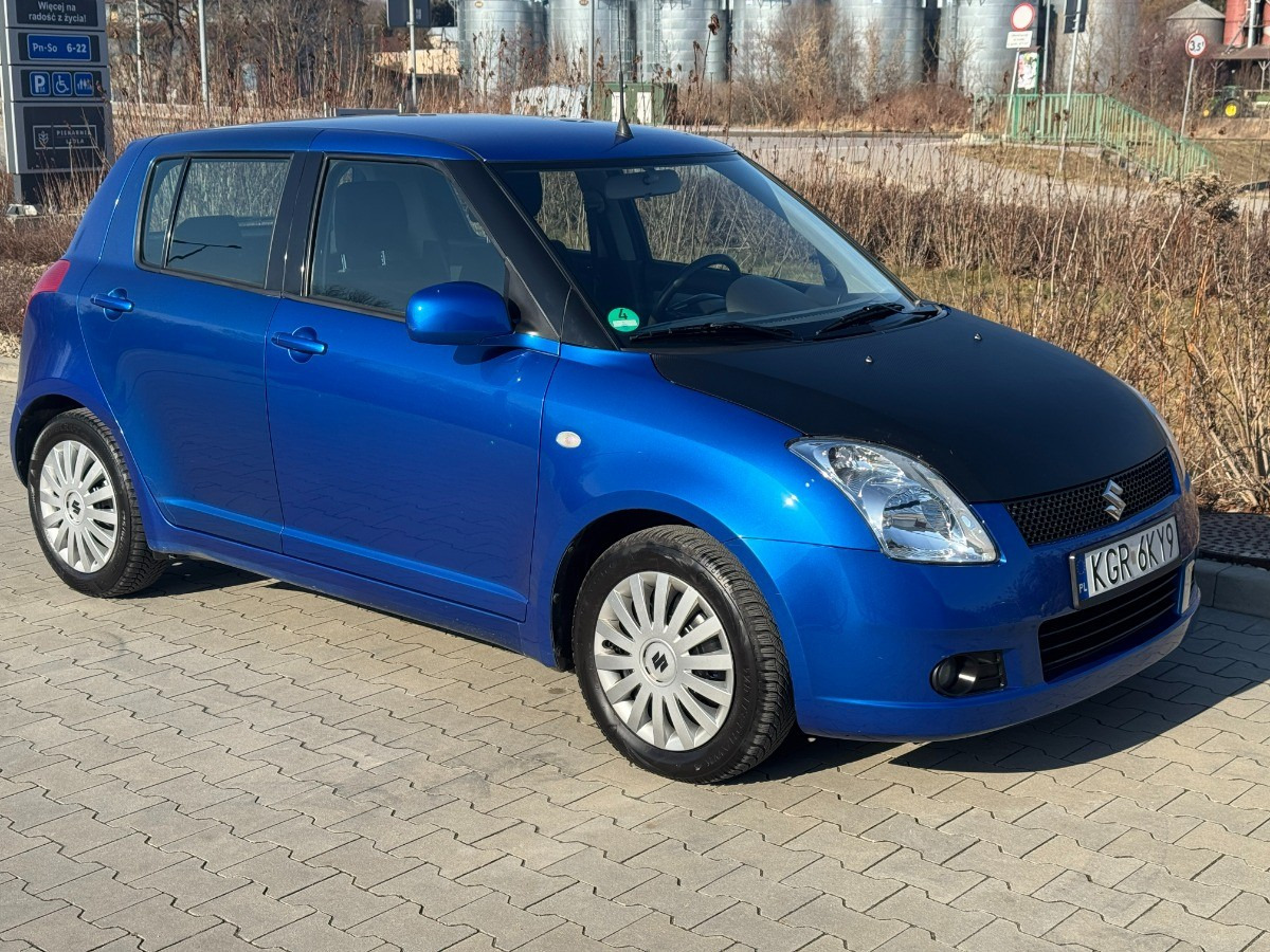 Suzuki Swift 1.3 benzyna 90km Klimatyzacja 136tys przebieg Auto prywatne zadbane - Αυτοκίνητο: φωτογραφία 2 Suzuki Swift 1.3 benzyna 90km Klimatyzacja 136tys przebieg Auto prywatne zadbane - Αυτοκίνητο: φωτογραφία 2