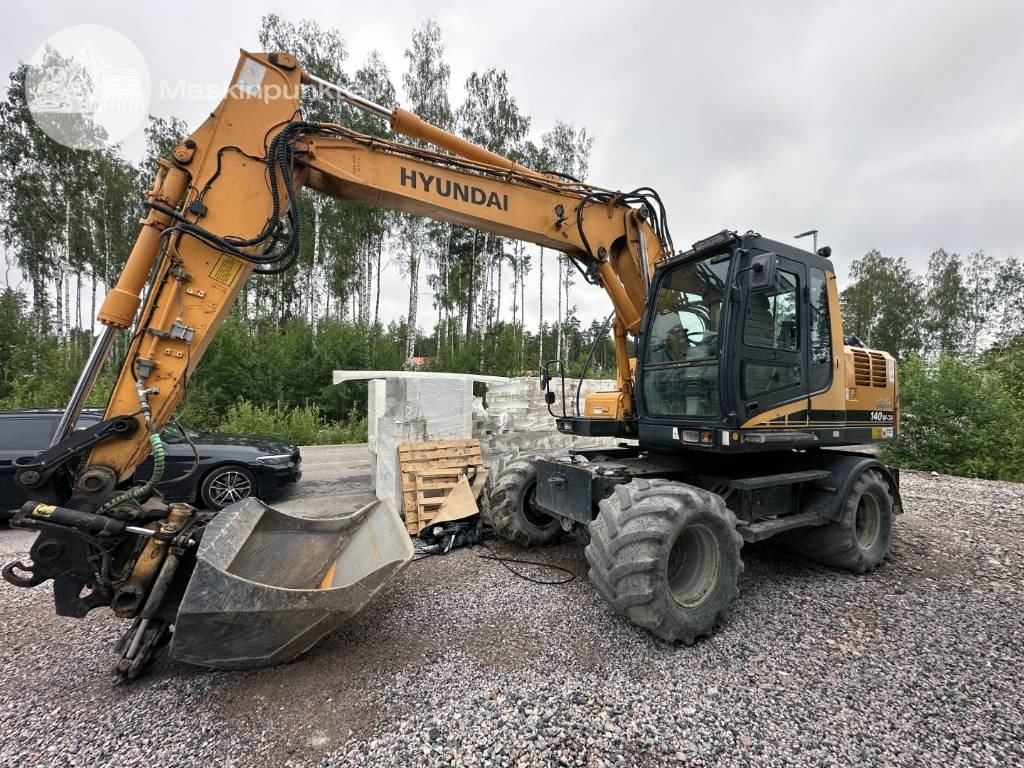 Hyundai Robex 140 W-7 A - Τροχοφόρος εκσκαφέας: φωτογραφία 1 Hyundai Robex 140 W-7 A - Τροχοφόρος εκσκαφέας: φωτογραφία 1