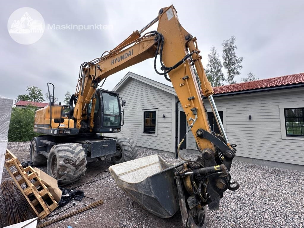 Hyundai Robex 140 W-7 A - Τροχοφόρος εκσκαφέας: φωτογραφία 3 Hyundai Robex 140 W-7 A - Τροχοφόρος εκσκαφέας: φωτογραφία 3
