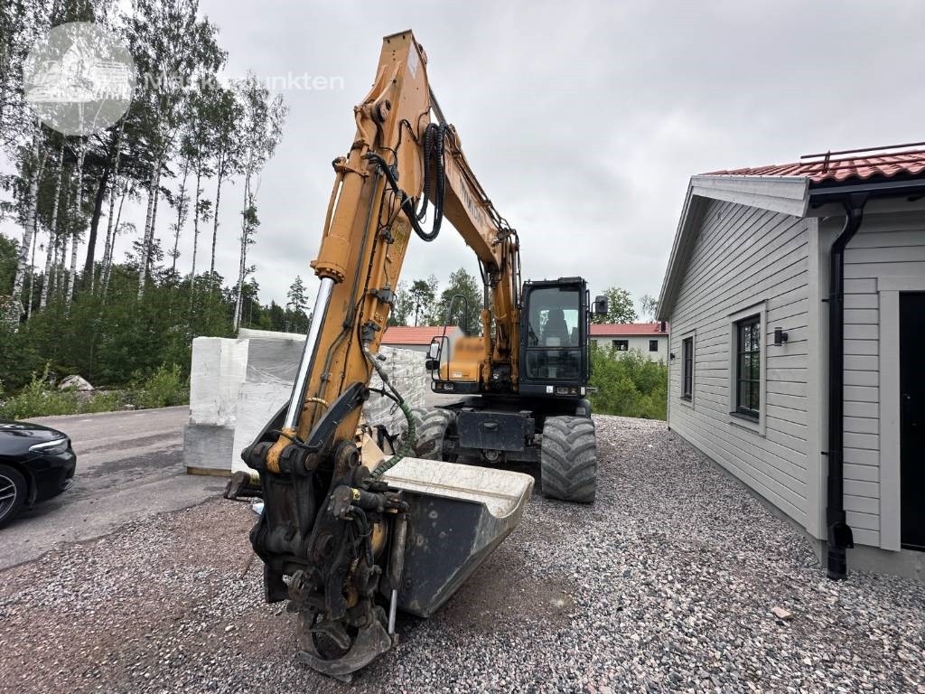 Hyundai Robex 140 W-7 A - Τροχοφόρος εκσκαφέας: φωτογραφία 2 Hyundai Robex 140 W-7 A - Τροχοφόρος εκσκαφέας: φωτογραφία 2