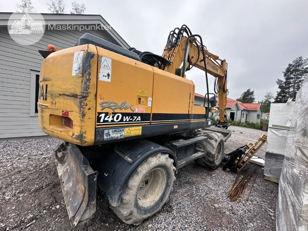 Hyundai Robex 140 W-7 A - Τροχοφόρος εκσκαφέας: φωτογραφία 4 Hyundai Robex 140 W-7 A - Τροχοφόρος εκσκαφέας: φωτογραφία 4