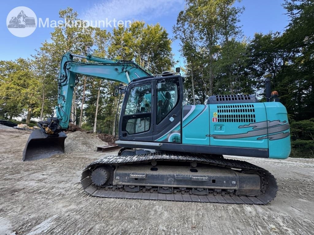Kobelco SK 210 LC-10 - Ερπυστριοφόρος εκσκαφέας: φωτογραφία 2 Kobelco SK 210 LC-10 - Ερπυστριοφόρος εκσκαφέας: φωτογραφία 2