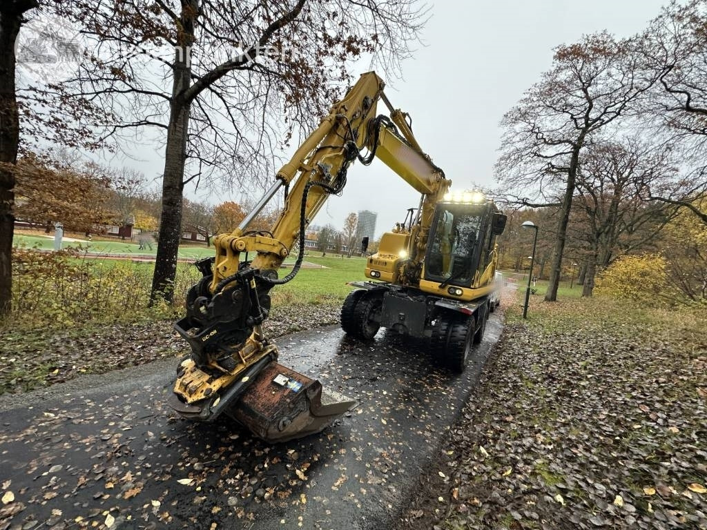 Komatsu PW 148-11 med vagn och redskap - Τροχοφόρος εκσκαφέας: φωτογραφία 2 Komatsu PW 148-11 med vagn och redskap - Τροχοφόρος εκσκαφέας: φωτογραφία 2