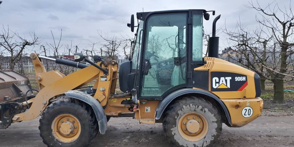 Ładowarka Caterpillar 906H widły + łyżka - Ελαστιχοφόρος φορτωτής: φωτογραφία 1 Ładowarka Caterpillar 906H widły + łyżka - Ελαστιχοφόρος φορτωτής: φωτογραφία 1
