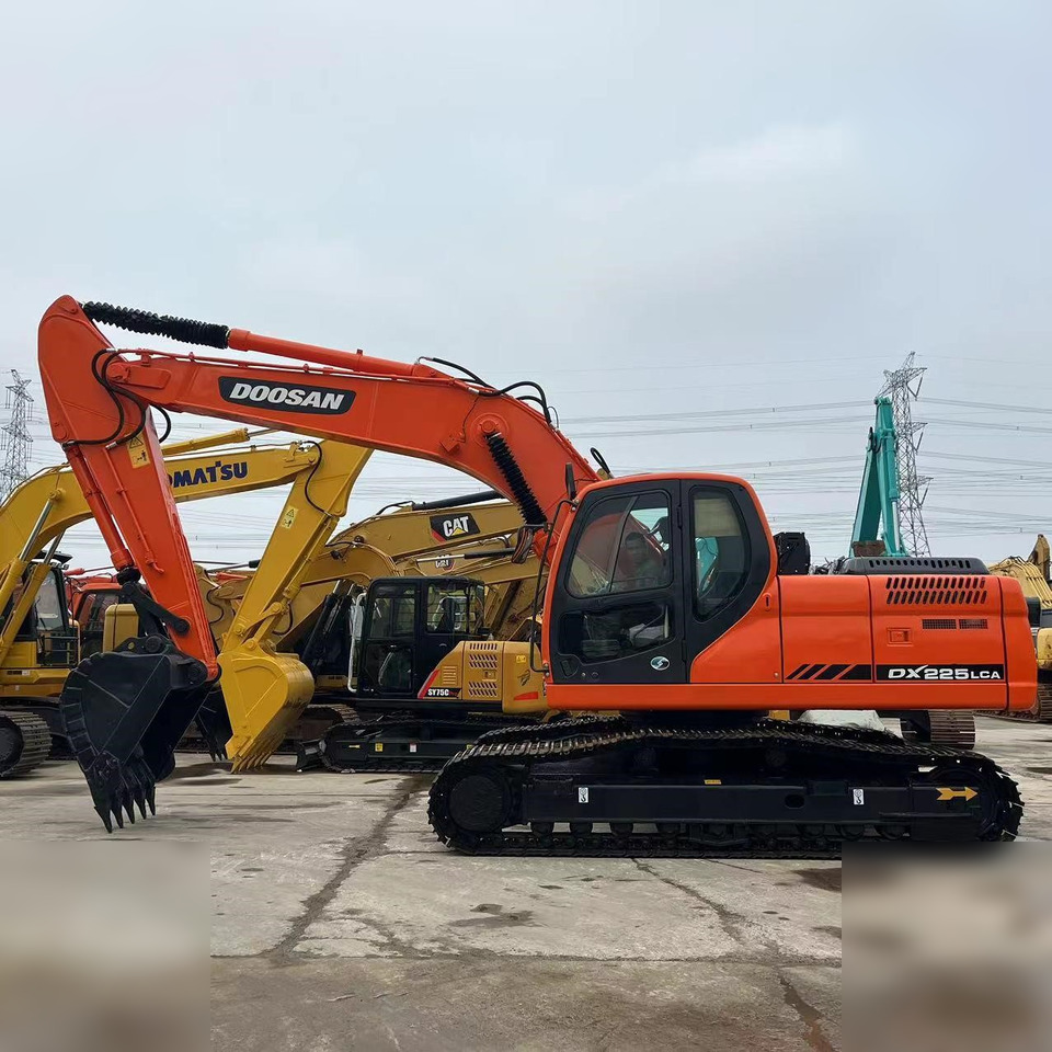 DOOSAN DX225 LCA - Ερπυστριοφόρος εκσκαφέας: φωτογραφία 1 DOOSAN DX225 LCA - Ερπυστριοφόρος εκσκαφέας: φωτογραφία 1