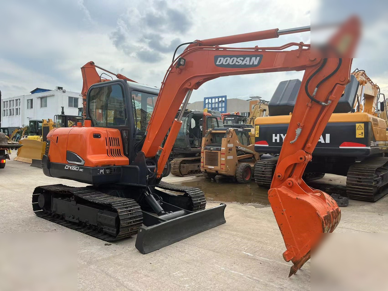 DOOSAN DX60-9C - Ερπυστριοφόρος εκσκαφέας: φωτογραφία 1 DOOSAN DX60-9C - Ερπυστριοφόρος εκσκαφέας: φωτογραφία 1