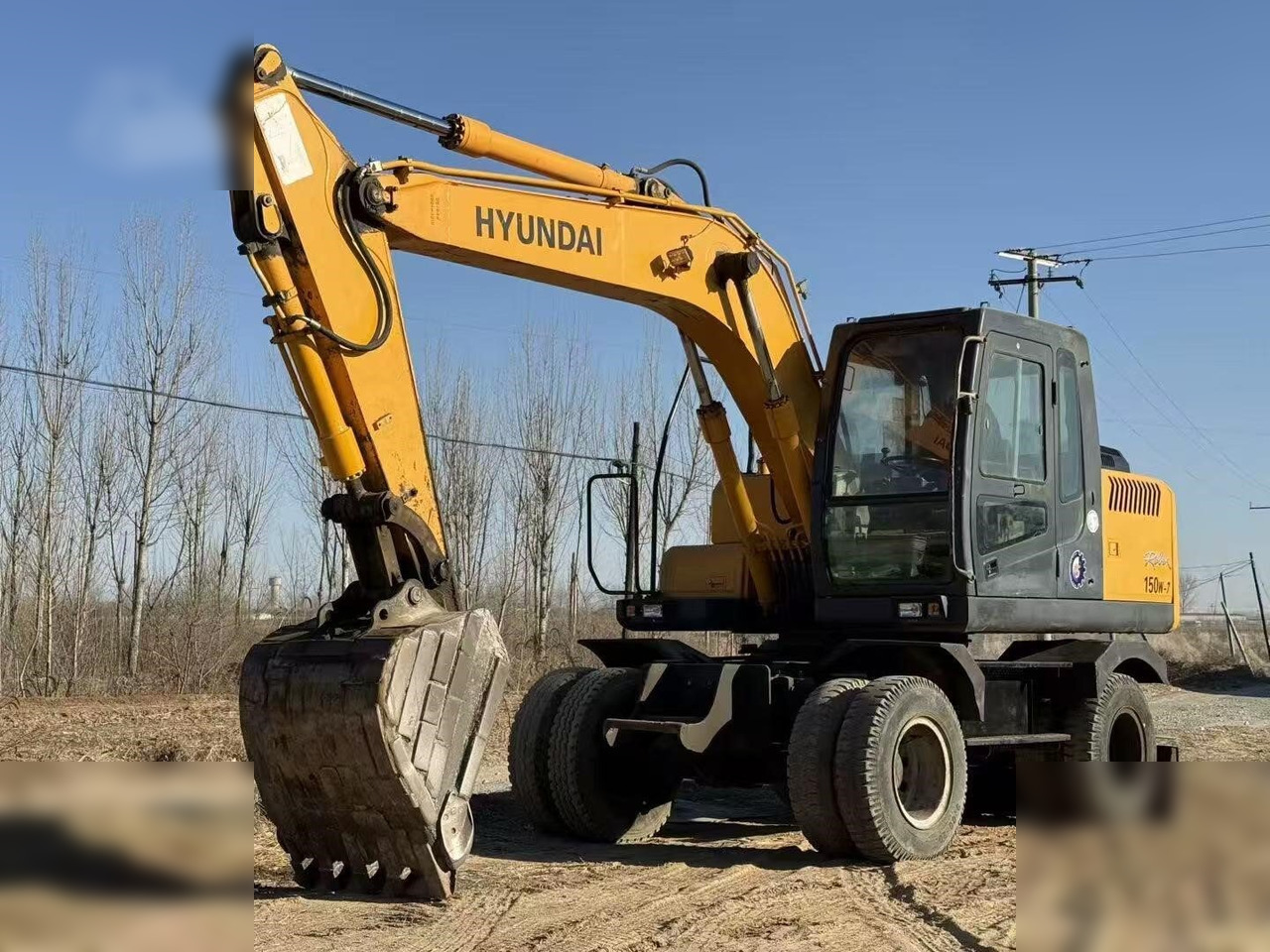 HYUNDAI ROBEX 150W-7A - Τροχοφόρος εκσκαφέας: φωτογραφία 3 HYUNDAI ROBEX 150W-7A - Τροχοφόρος εκσκαφέας: φωτογραφία 3