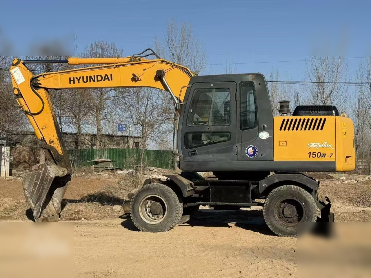 HYUNDAI ROBEX 150W-7A - Τροχοφόρος εκσκαφέας: φωτογραφία 1 HYUNDAI ROBEX 150W-7A - Τροχοφόρος εκσκαφέας: φωτογραφία 1