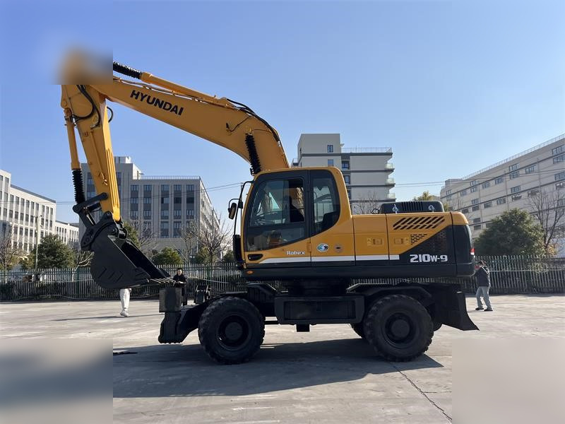 HYUNDAI ROBEX 210W-9 - Τροχοφόρος εκσκαφέας: φωτογραφία 1 HYUNDAI ROBEX 210W-9 - Τροχοφόρος εκσκαφέας: φωτογραφία 1