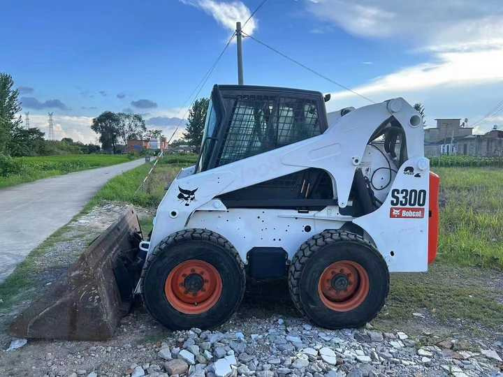 Used Bob Cat Bob Cat S300 Used Mini Skid Steer Wheel Loader Multifunctional Track Loaders Bobcat S300 - Φορτωτής πλάγιας ολίσθησης: φωτογραφία 4 Used Bob Cat Bob Cat S300 Used Mini Skid Steer Wheel Loader Multifunctional Track Loaders Bobcat S300 - Φορτωτής πλάγιας ολίσθησης: φωτογραφία 4
