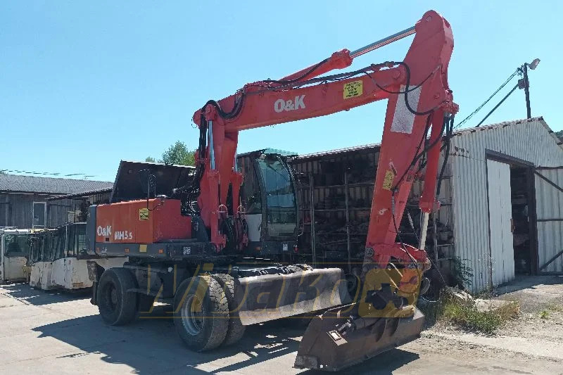 O&K MH5.5 - Τροχοφόρος εκσκαφέας: φωτογραφία 1 O&K MH5.5 - Τροχοφόρος εκσκαφέας: φωτογραφία 1