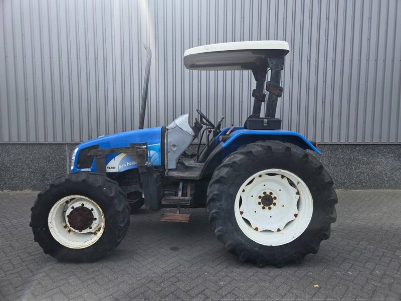 New Holland TL 90 A - Τρακτέρ: φωτογραφία 2 New Holland TL 90 A - Τρακτέρ: φωτογραφία 2