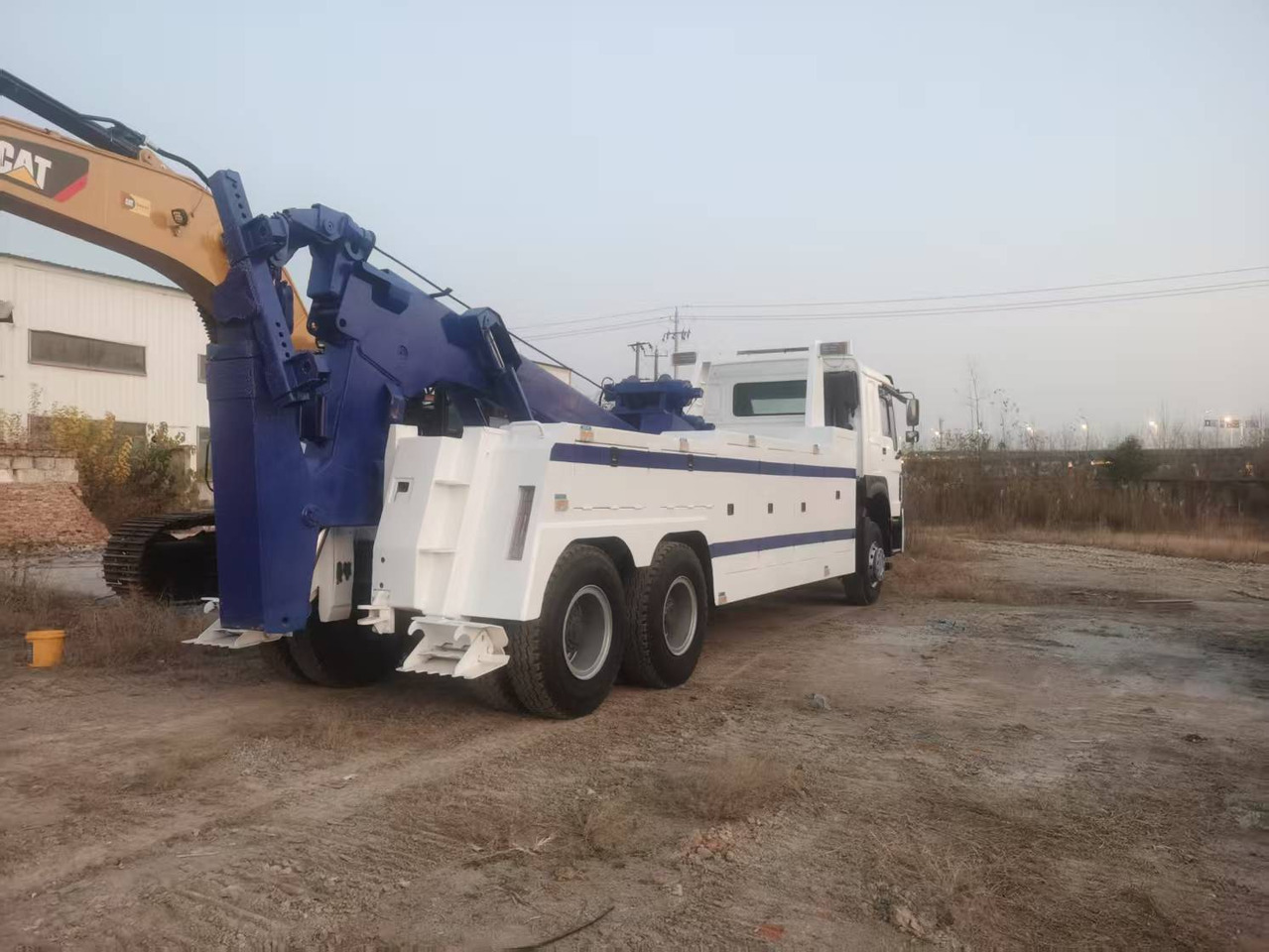 HOWO tow truck - Φορτηγό με γερανό: φωτογραφία 3 HOWO tow truck - Φορτηγό με γερανό: φωτογραφία 3