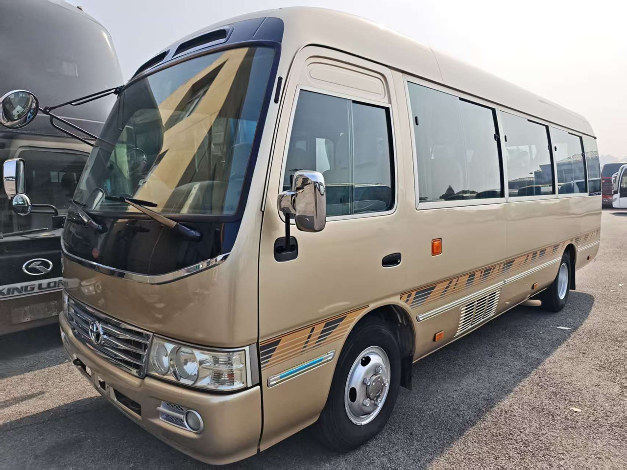 TOYOTA COASTER 23 seats - Πούλμαν: φωτογραφία 1 TOYOTA COASTER 23 seats - Πούλμαν: φωτογραφία 1