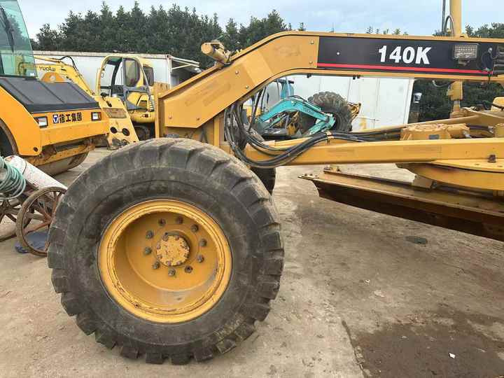 Used Caterpillar CAT 140k Land Road Motor Grader CAT140k Used Grader Cheap Price for Sale - Γκρέιντερ: φωτογραφία 4 Used Caterpillar CAT 140k Land Road Motor Grader CAT140k Used Grader Cheap Price for Sale - Γκρέιντερ: φωτογραφία 4