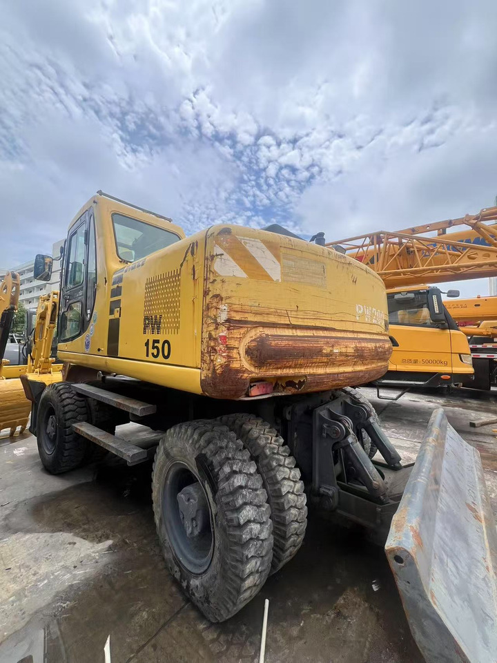 KOMATSU PW150 - Τροχοφόρος εκσκαφέας: φωτογραφία 1 KOMATSU PW150 - Τροχοφόρος εκσκαφέας: φωτογραφία 1