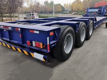 TITAN 120 Ton Lowboy Truck Trailer for Sale in Zambia - Επικαθήμενο με χαμηλό δάπεδο: φωτογραφία 1 TITAN 120 Ton Lowboy Truck Trailer for Sale in Zambia - Επικαθήμενο με χαμηλό δάπεδο: φωτογραφία 1