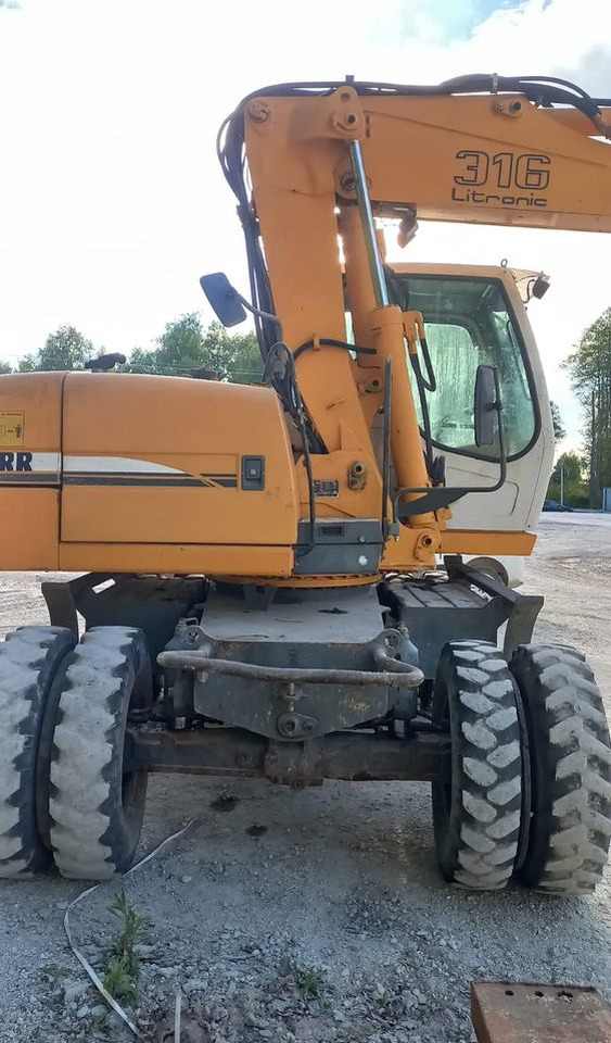 Liebherr A316 - Τροχοφόρος εκσκαφέας: φωτογραφία 3 Liebherr A316 - Τροχοφόρος εκσκαφέας: φωτογραφία 3