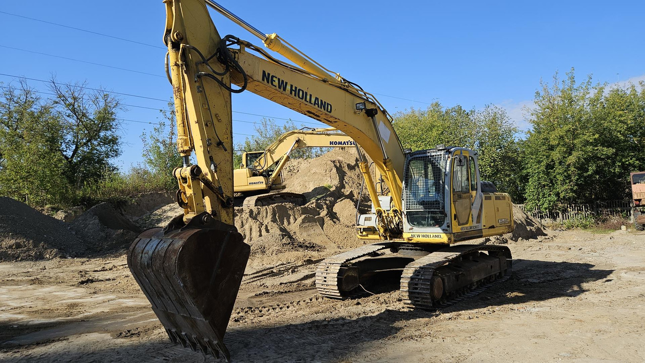 NEW HOLLAND E 245 B - Ερπυστριοφόρος εκσκαφέας: φωτογραφία 1 NEW HOLLAND E 245 B - Ερπυστριοφόρος εκσκαφέας: φωτογραφία 1