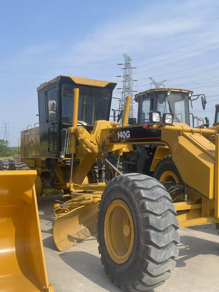 CATERPILLAR 140g used motor grader Source supply low price Road construction equipment - Γκρέιντερ: φωτογραφία 1 CATERPILLAR 140g used motor grader Source supply low price Road construction equipment - Γκρέιντερ: φωτογραφία 1