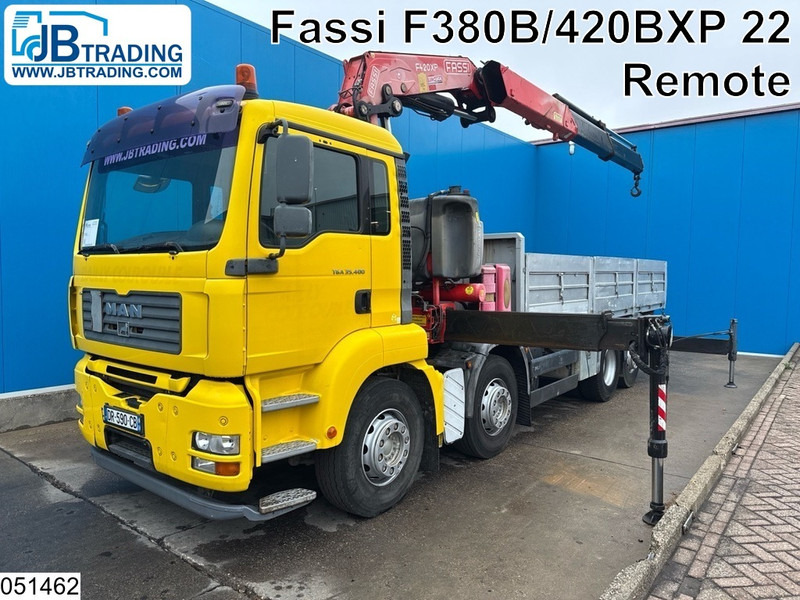 MAN TGA 35 400 8x2, Handgeschakeld, Fassi, Remote - Φορτηγό με ανοιχτή καρότσα, Φορτηγό με γερανό: φωτογραφία 1 MAN TGA 35 400 8x2, Handgeschakeld, Fassi, Remote - Φορτηγό με ανοιχτή καρότσα, Φορτηγό με γερανό: φωτογραφία 1