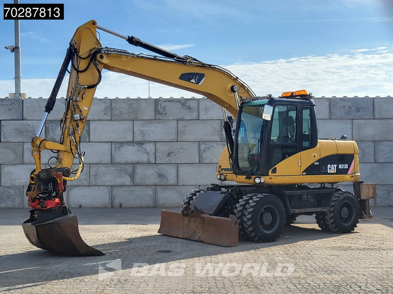 Caterpillar M313 D OUTRIGGERS + BLADE - Τροχοφόρος εκσκαφέας: φωτογραφία 2 Caterpillar M313 D OUTRIGGERS + BLADE - Τροχοφόρος εκσκαφέας: φωτογραφία 2