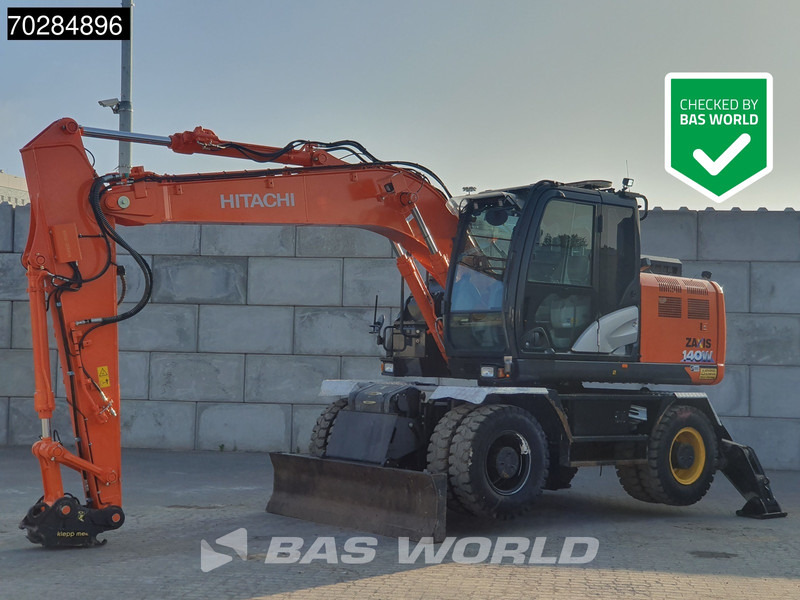 Hitachi ZX140W -6 OUTRIGGERS + BLADE - Τροχοφόρος εκσκαφέας: φωτογραφία 1 Hitachi ZX140W -6 OUTRIGGERS + BLADE - Τροχοφόρος εκσκαφέας: φωτογραφία 1
