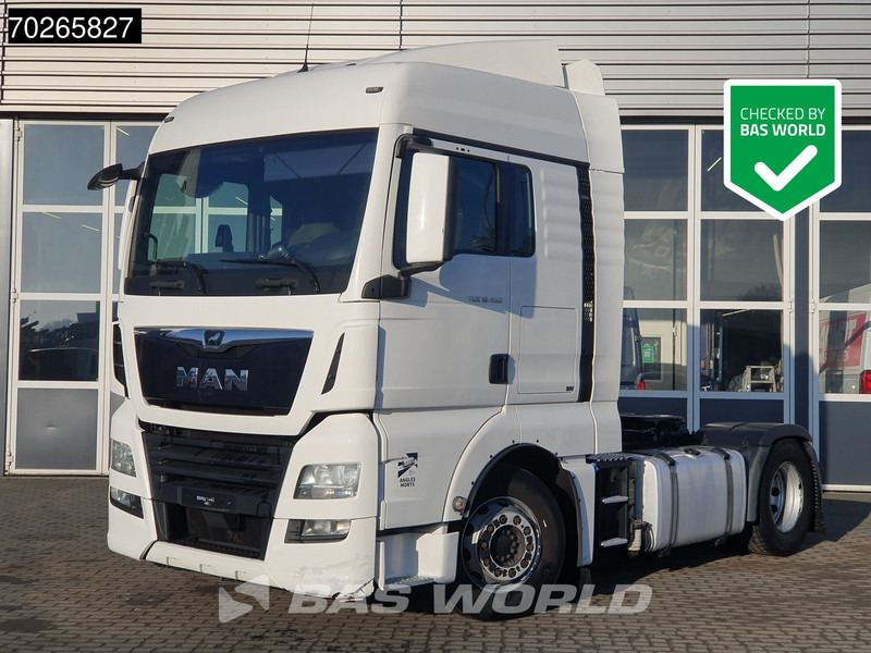 MAN TGX 18.460 4X2 XLX Retarder 2x Tanks ACC Standklima - Τράκτορας: φωτογραφία 1 MAN TGX 18.460 4X2 XLX Retarder 2x Tanks ACC Standklima - Τράκτορας: φωτογραφία 1