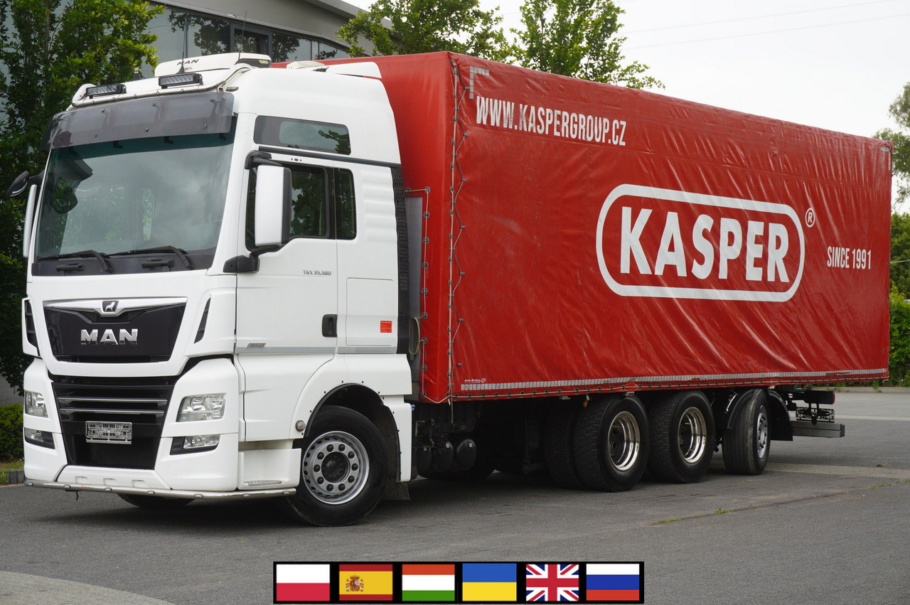 MAN MAN TGX 35.580 E6 8x4 /4 / 23 EPAL tarp superstructure / 4th axle steered - Φορτηγό μουσαμάς: φωτογραφία 1 MAN MAN TGX 35.580 E6 8x4 /4 / 23 EPAL tarp superstructure / 4th axle steered - Φορτηγό μουσαμάς: φωτογραφία 1
