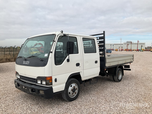 2006 Isuzu NPR77 4x2 Crew Cab Flatbed Truck - Φορτηγό με ανοιχτή καρότσα: φωτογραφία 1 2006 Isuzu NPR77 4x2 Crew Cab Flatbed Truck - Φορτηγό με ανοιχτή καρότσα: φωτογραφία 1