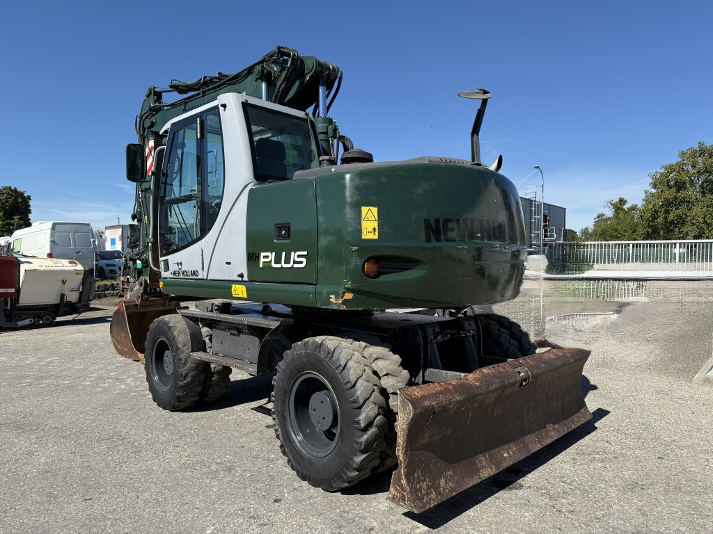 New Holland MH-Plus (111695) - Τροχοφόρος εκσκαφέας: φωτογραφία 4 New Holland MH-Plus (111695) - Τροχοφόρος εκσκαφέας: φωτογραφία 4