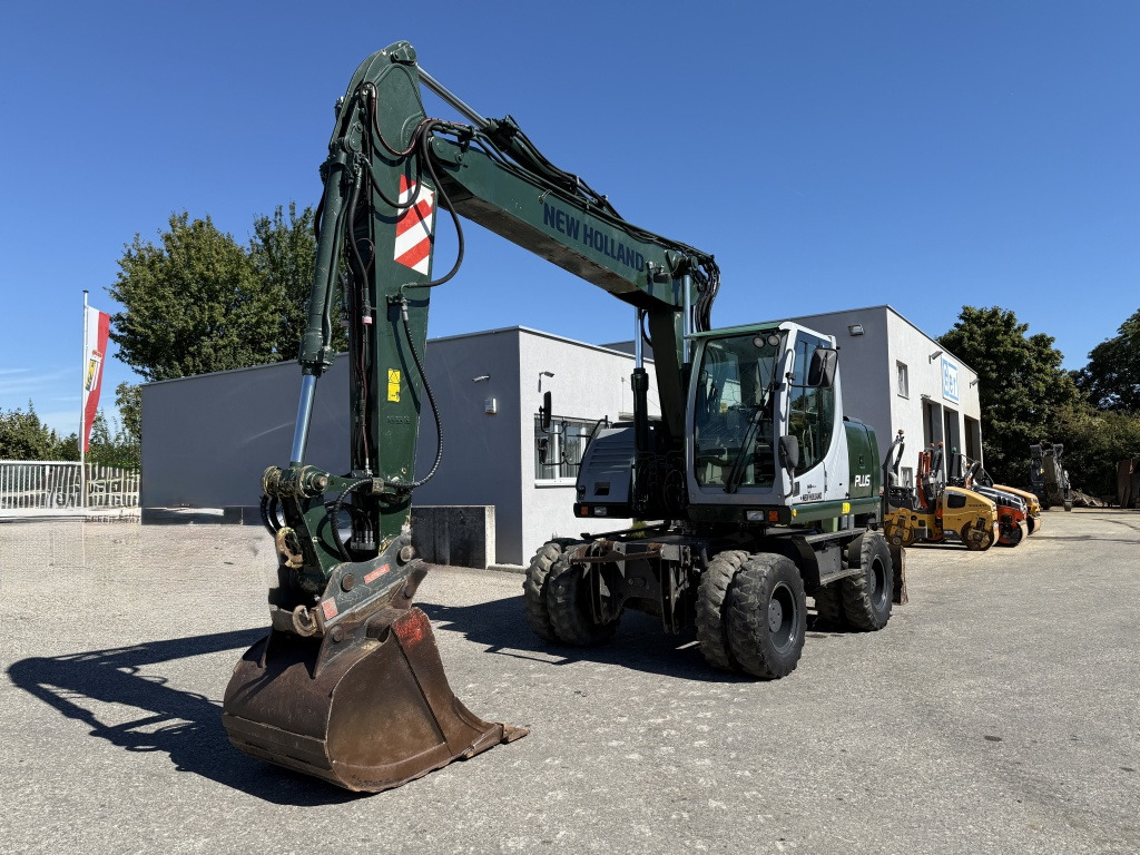 New Holland MH-Plus (111695) - Τροχοφόρος εκσκαφέας: φωτογραφία 3 New Holland MH-Plus (111695) - Τροχοφόρος εκσκαφέας: φωτογραφία 3