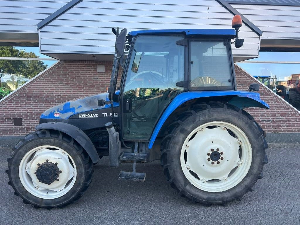 New Holland TL 90  - Τρακτέρ: φωτογραφία 2 New Holland TL 90  - Τρακτέρ: φωτογραφία 2