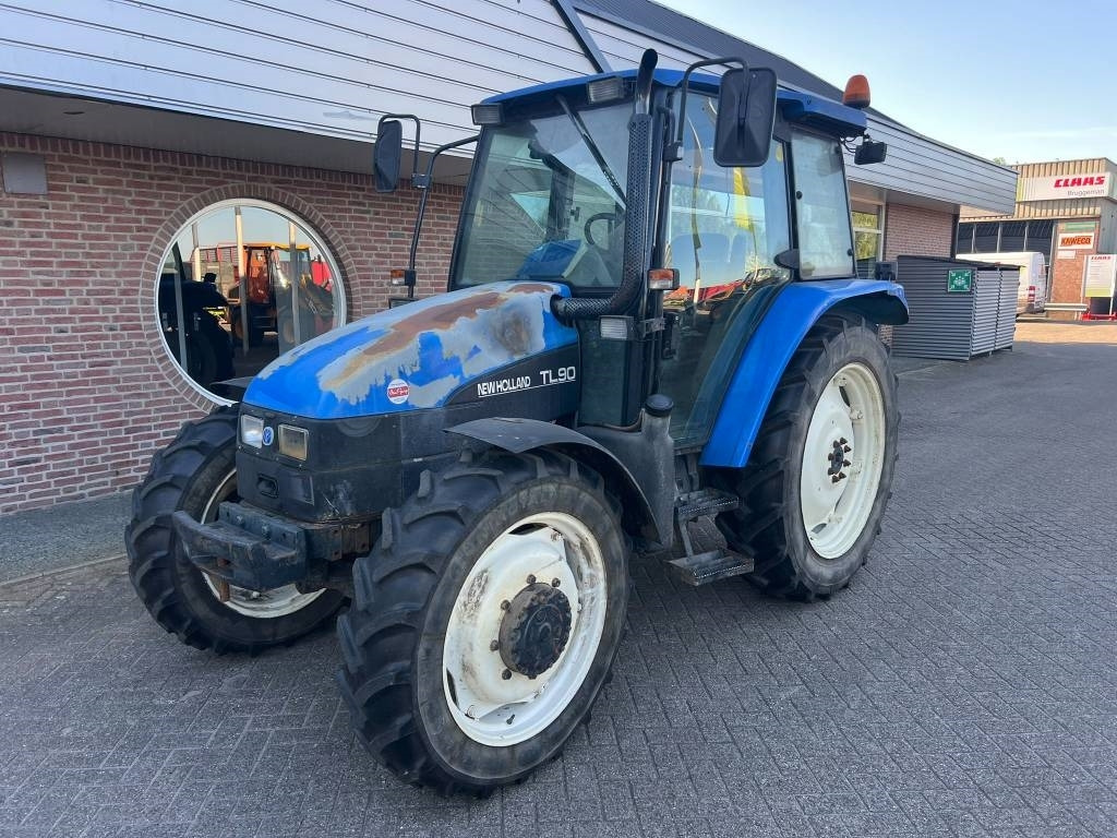 New Holland TL 90  - Τρακτέρ: φωτογραφία 1 New Holland TL 90  - Τρακτέρ: φωτογραφία 1