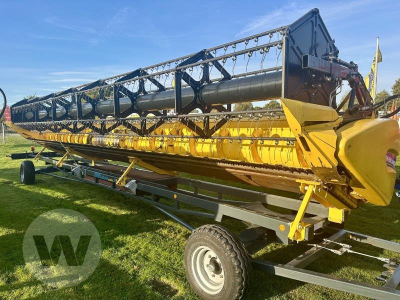 New Holland Schneidwerk 10,70 m - Θεριζοαλωνιστική μηχανή - κεφαλή: φωτογραφία 3 New Holland Schneidwerk 10,70 m - Θεριζοαλωνιστική μηχανή - κεφαλή: φωτογραφία 3