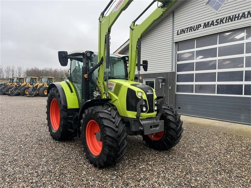 Τρακτέρ Claas Arion 440 CIS med frontlæsser: φωτογραφία 17