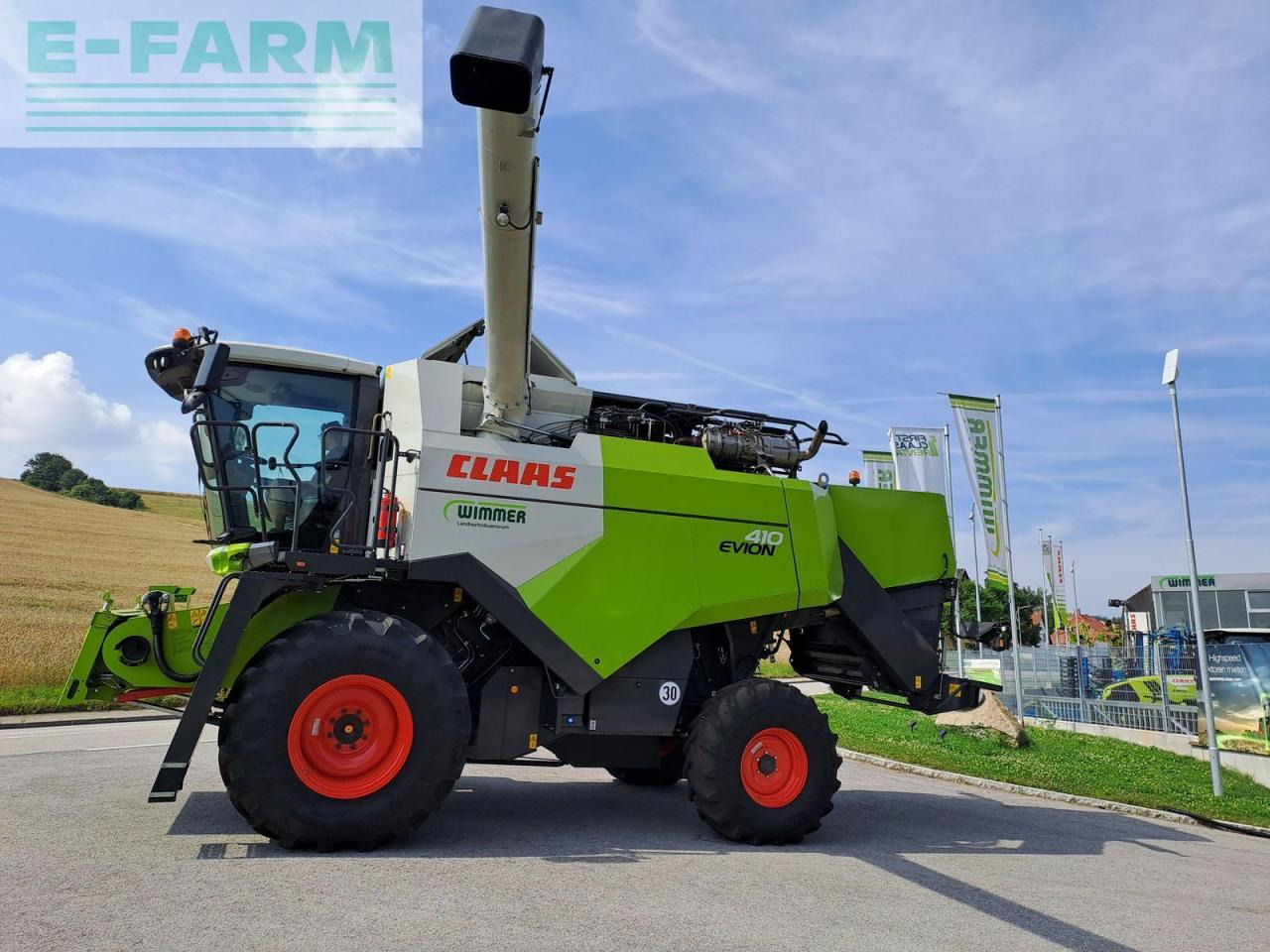 CLAAS evion 410 - Θεριζοαλωνιστική μηχανή: φωτογραφία 1 CLAAS evion 410 - Θεριζοαλωνιστική μηχανή: φωτογραφία 1