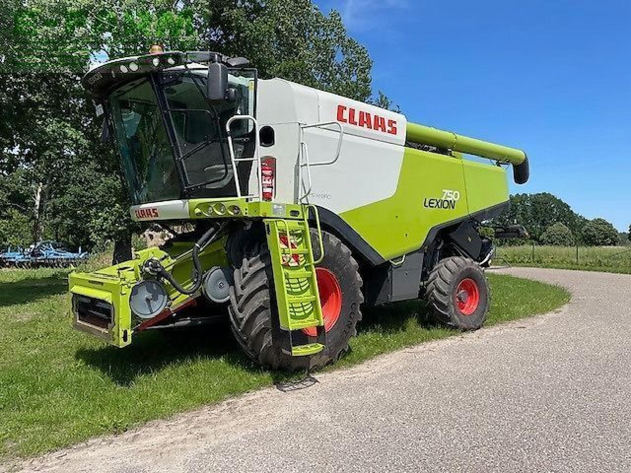 CLAAS lexion 750 mit vario 900 - Θεριζοαλωνιστική μηχανή: φωτογραφία 1 CLAAS lexion 750 mit vario 900 - Θεριζοαλωνιστική μηχανή: φωτογραφία 1