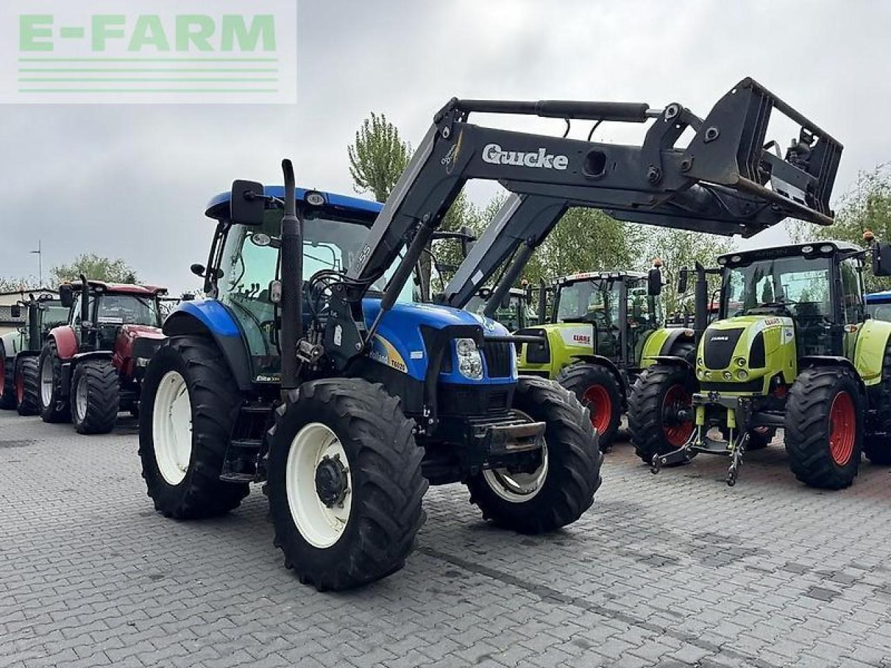 New Holland t6020 elite + quicke q55 Elite - Τρακτέρ: φωτογραφία 3 New Holland t6020 elite + quicke q55 Elite - Τρακτέρ: φωτογραφία 3