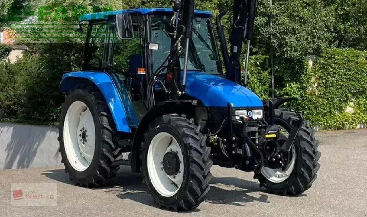 New Holland tl100 (4wd) - Τρακτέρ: φωτογραφία 3 New Holland tl100 (4wd) - Τρακτέρ: φωτογραφία 3