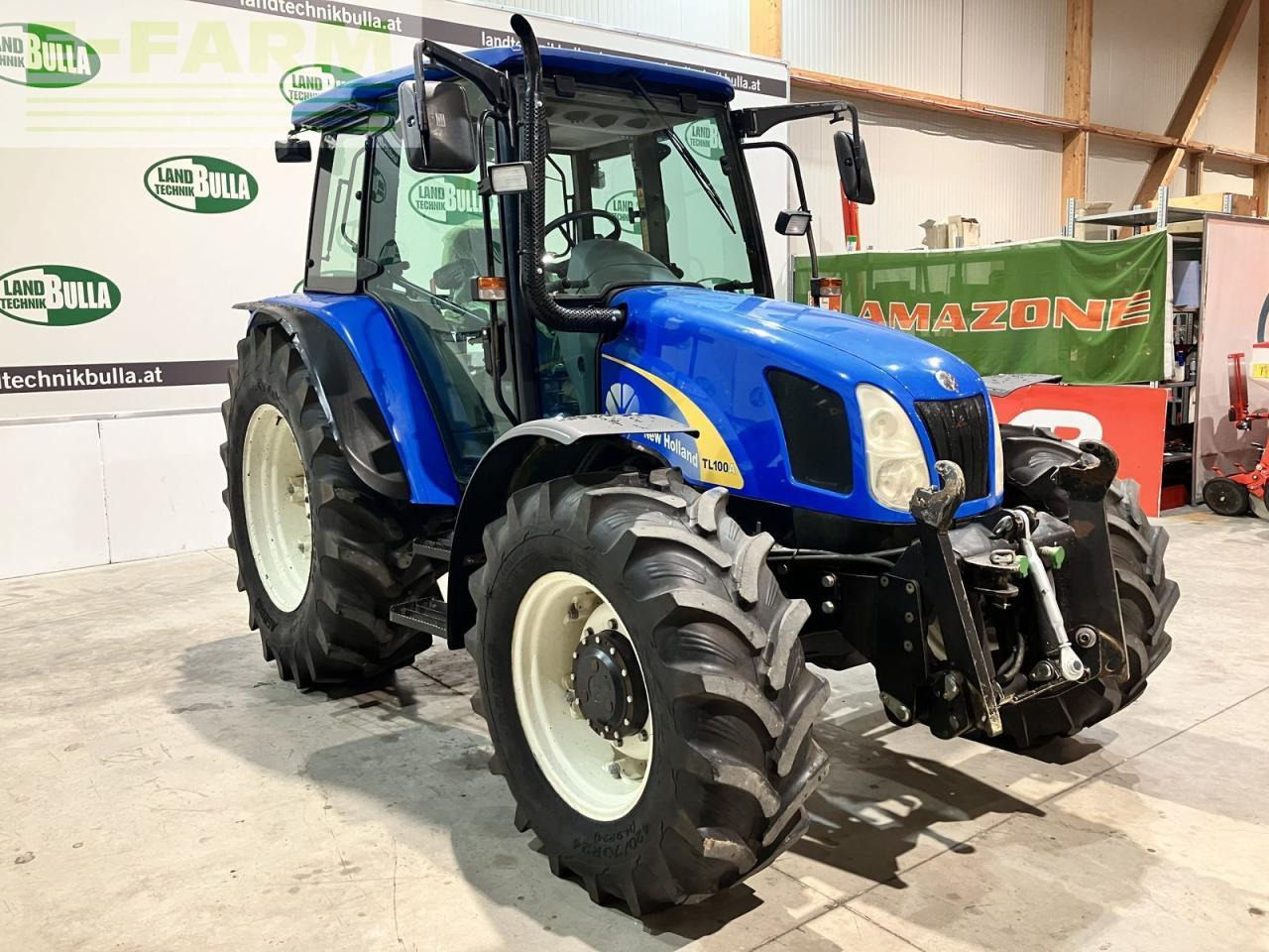 New Holland tl100a (4wd) A - Τρακτέρ: φωτογραφία 2 New Holland tl100a (4wd) A - Τρακτέρ: φωτογραφία 2