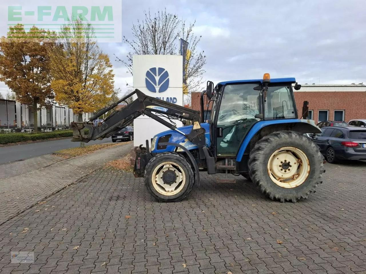 New Holland tla 80 - Τρακτέρ: φωτογραφία 1 New Holland tla 80 - Τρακτέρ: φωτογραφία 1
