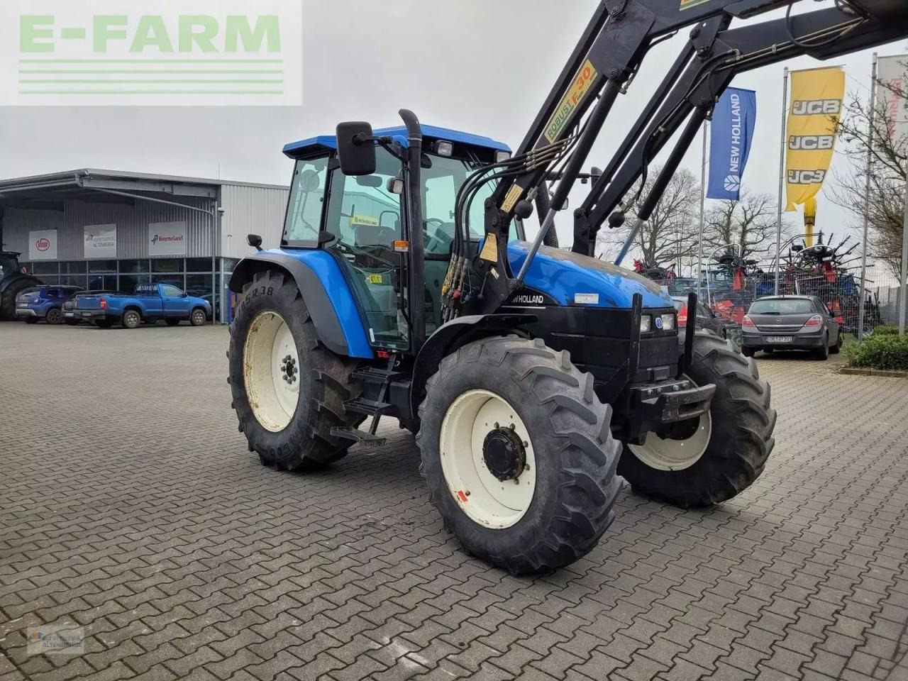 New Holland ts115 / ts 115 - Τρακτέρ: φωτογραφία 2 New Holland ts115 / ts 115 - Τρακτέρ: φωτογραφία 2