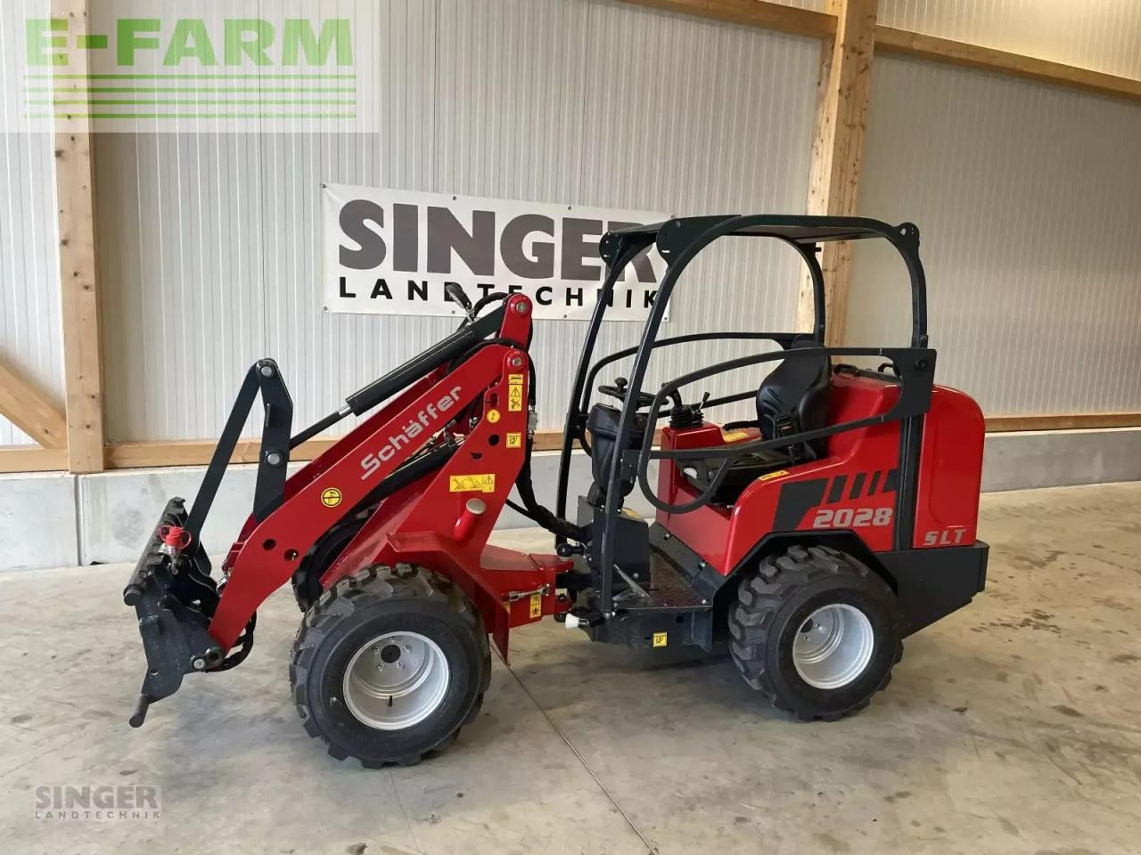 Schäffer 2028 slt - Ελαστιχοφόρος φορτωτής: φωτογραφία 1 Schäffer 2028 slt - Ελαστιχοφόρος φορτωτής: φωτογραφία 1