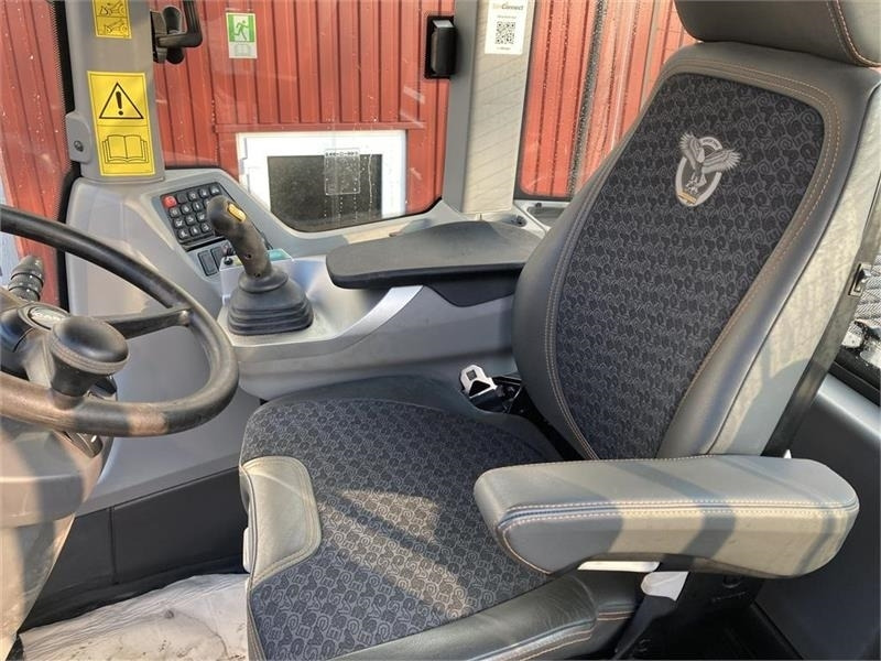 Ελαστιχοφόρος φορτωτής Case 721G: φωτογραφία 15