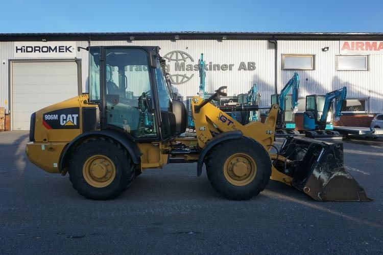 CAT 906 M - Ελαστιχοφόρος φορτωτής: φωτογραφία 1 CAT 906 M - Ελαστιχοφόρος φορτωτής: φωτογραφία 1