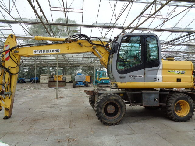 New Holland MH 4.6 - Τροχοφόρος εκσκαφέας: φωτογραφία 1 New Holland MH 4.6 - Τροχοφόρος εκσκαφέας: φωτογραφία 1